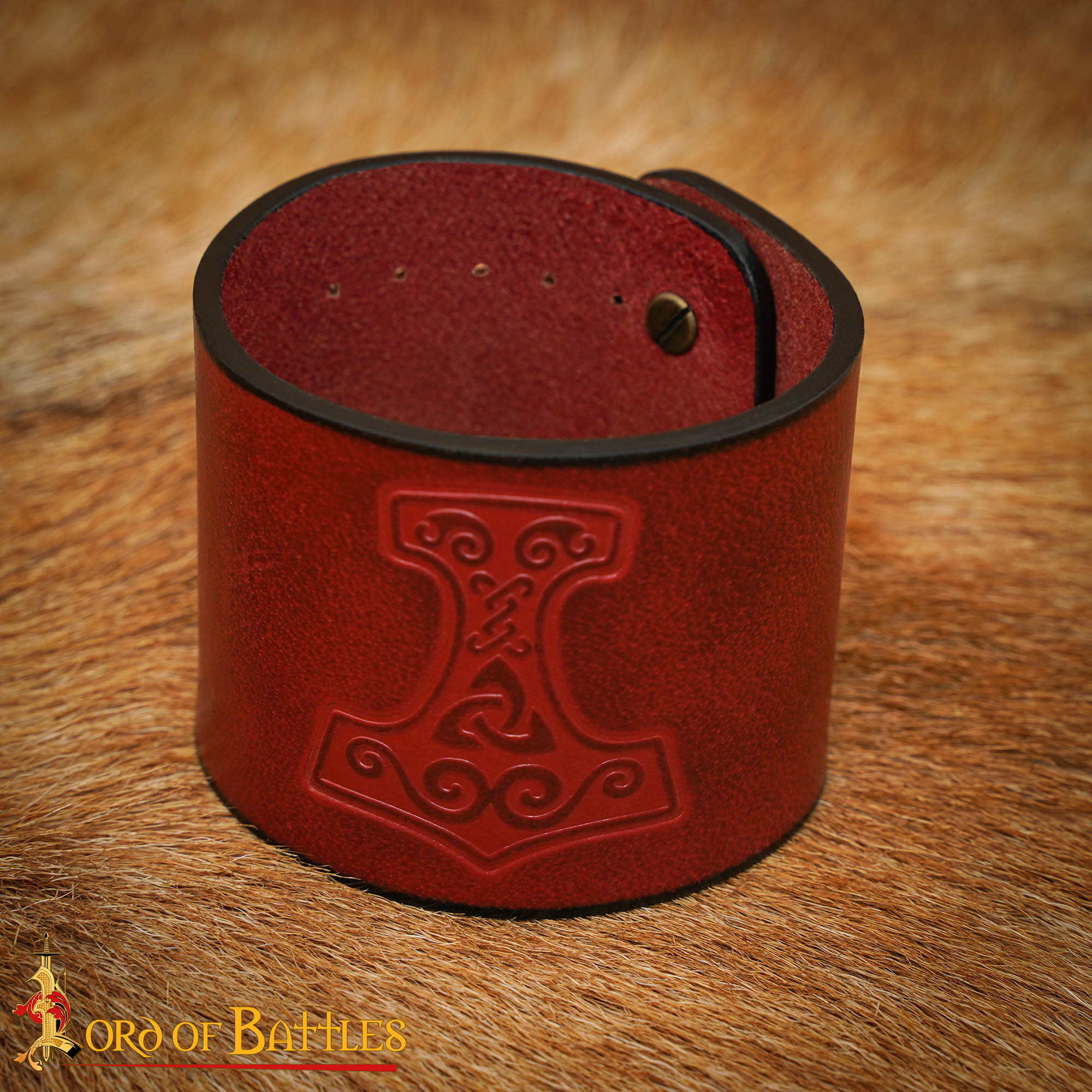 Medieval leather bracelet with Thor's hammer embossed design, garnet color