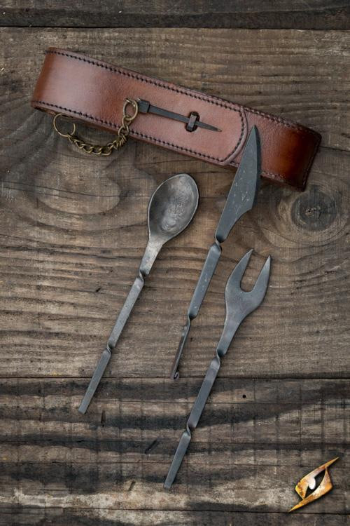 Medieval cutlery with brown cover: spoon, fork and knife