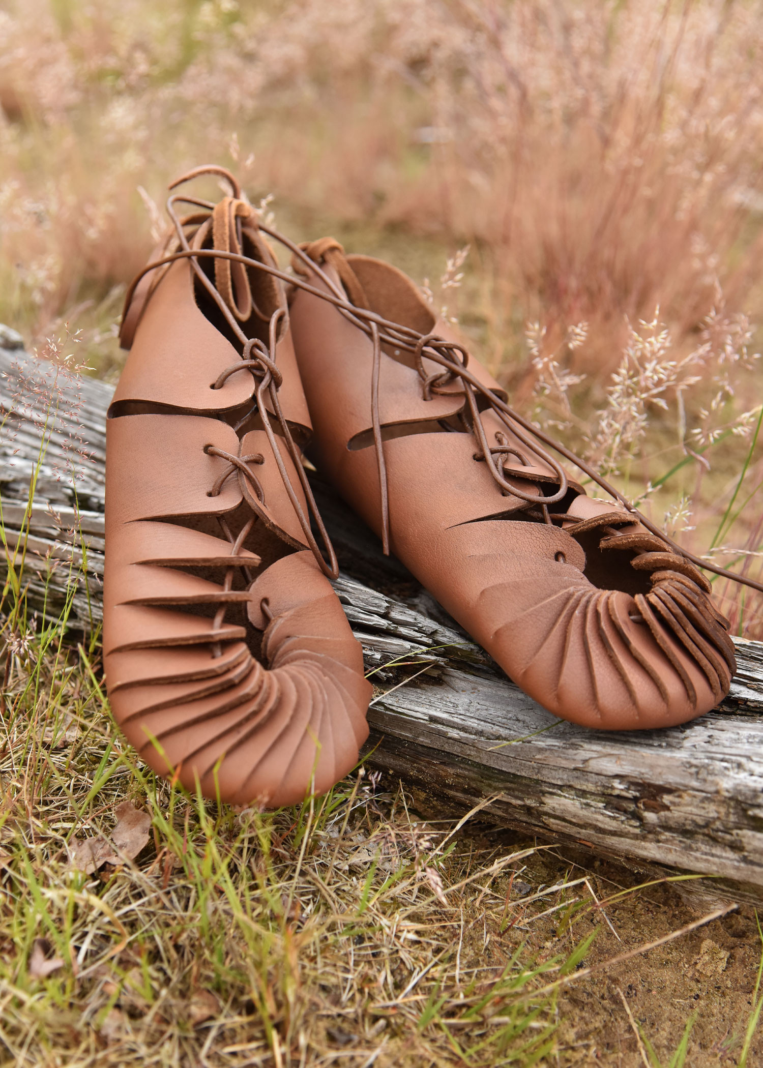 Brown leather Roman sandals with lace closure